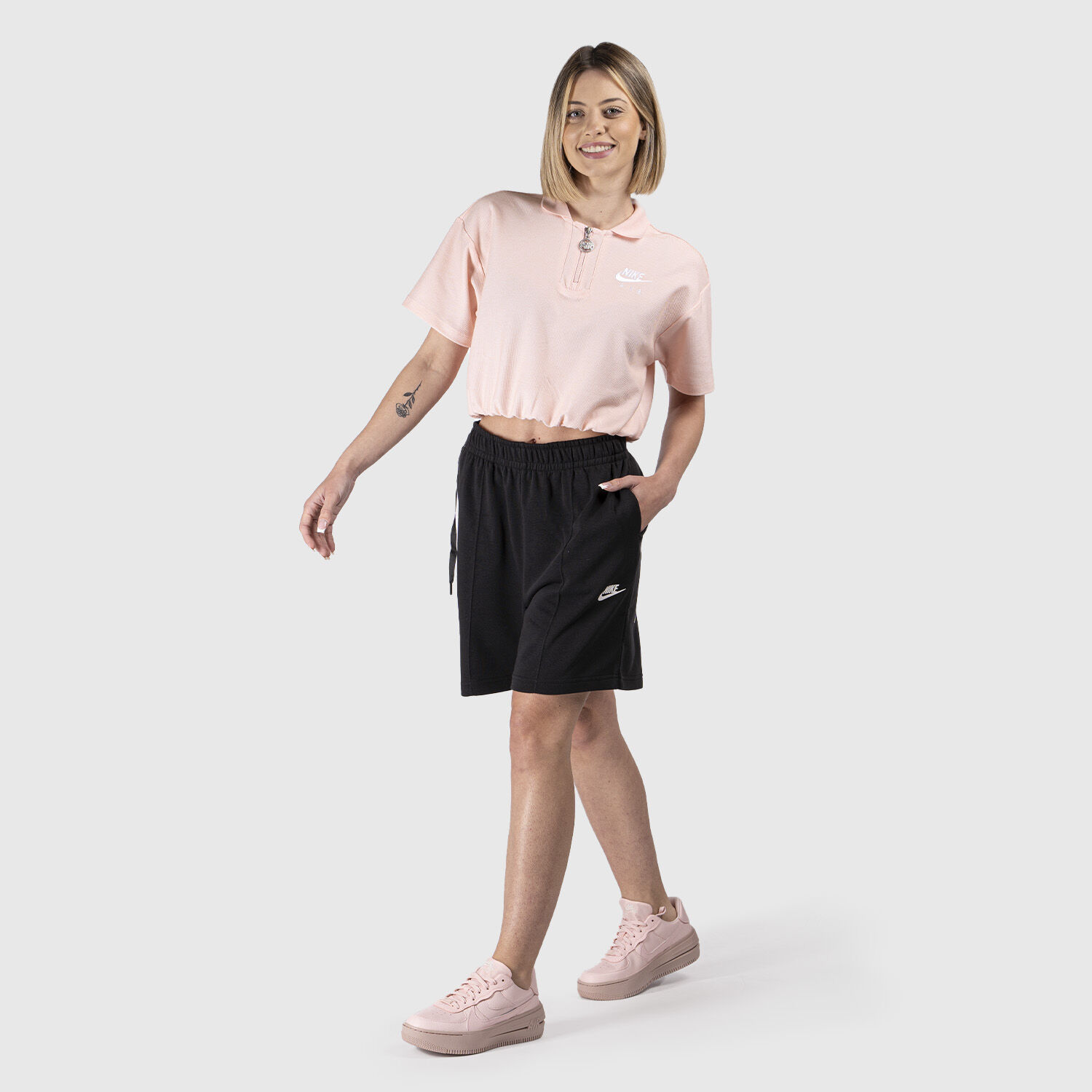 Polo rosa shop nike