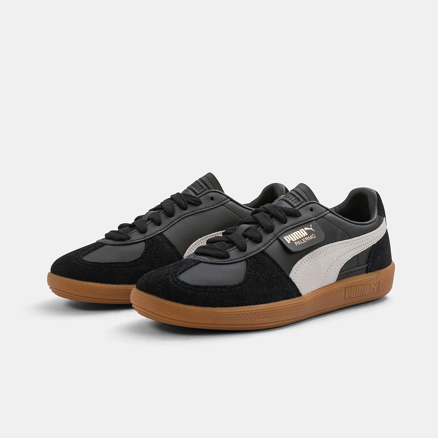 Puma scarpe nere con suola discount marrone