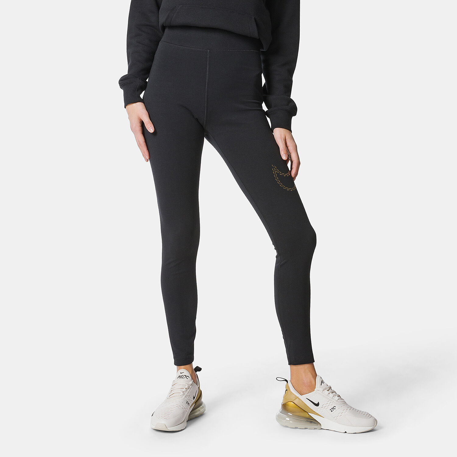 Pantaloni nike donna oro best sale
