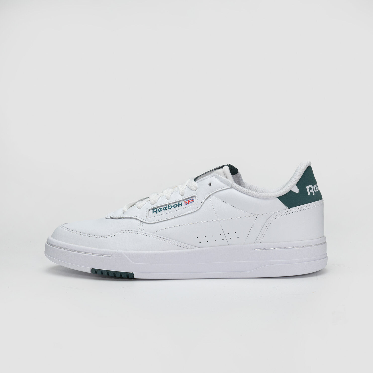 Reebok freestyle low uomo sales bianche