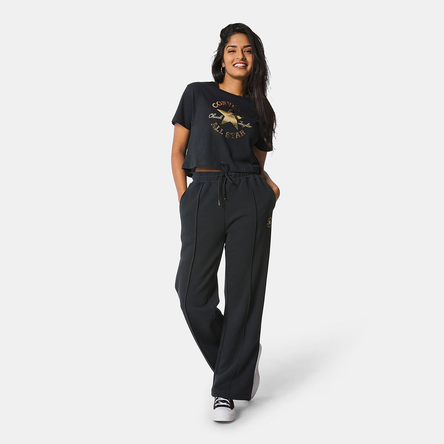 Converse tuta nera e top oro