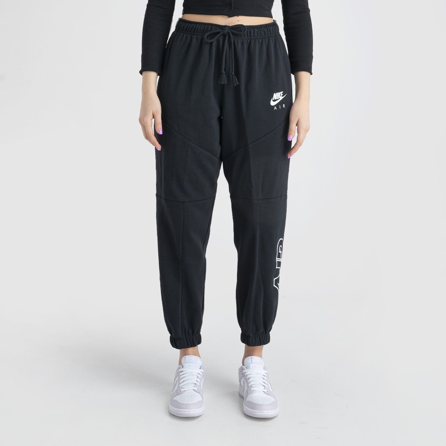 Pantaloni nike deals bianchi uomo