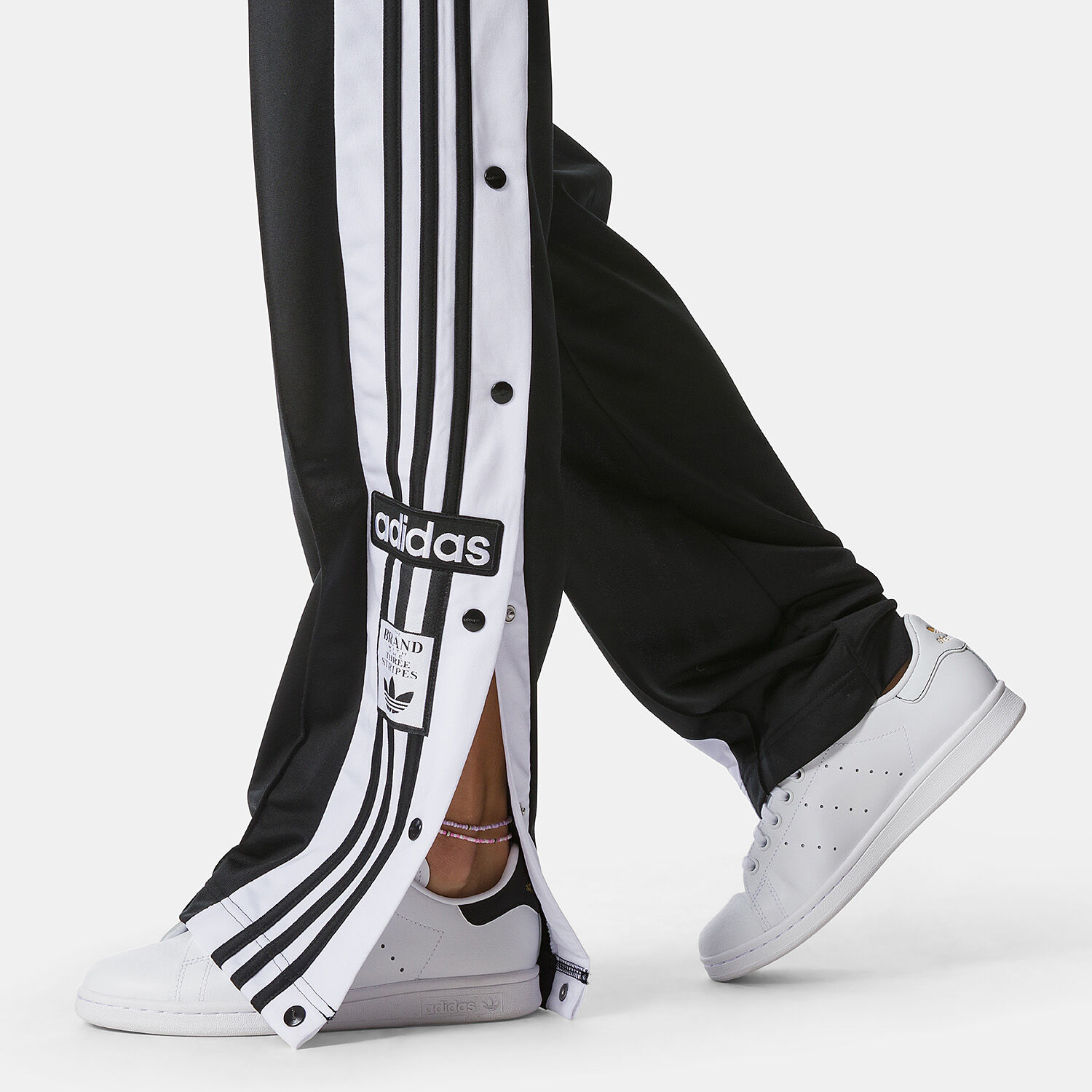 Pantaloni adidas con i bottoni shop