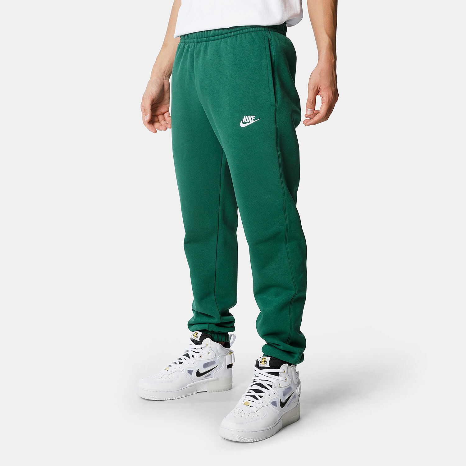 Pantaloni nike verdi strisce bianche 2025
