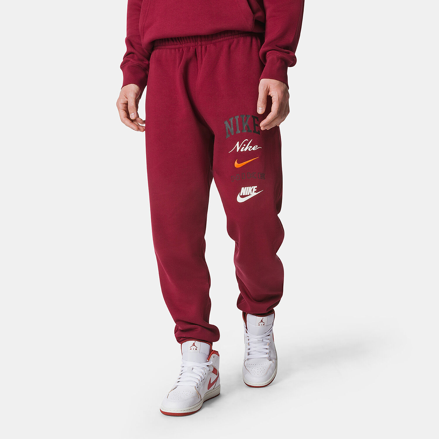 Pantaloni Nike Club Fleece bordeaux nero e arancione AW LAB