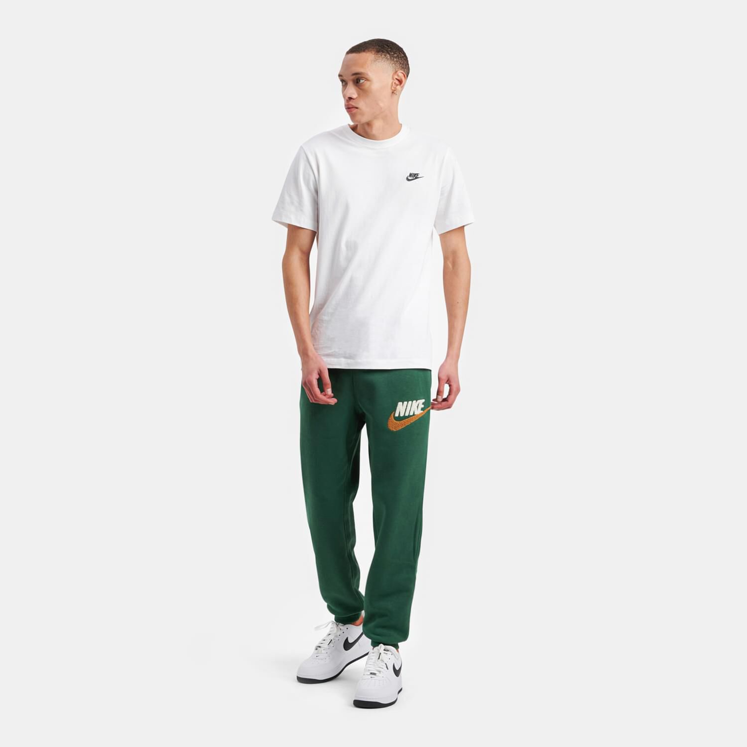 Pantaloni nike verdi strisce bianche 2025