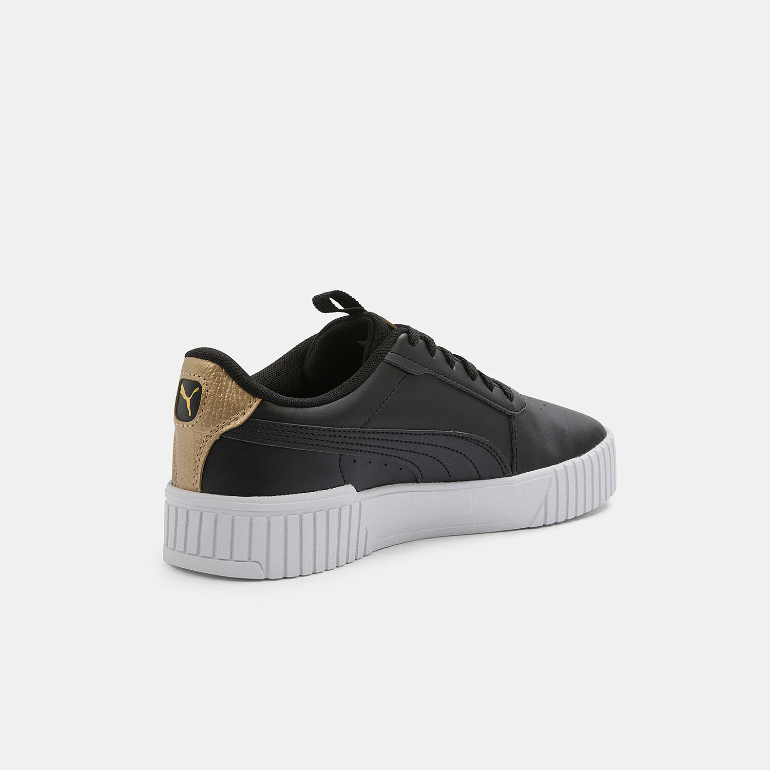 Puma nere con punta oro sales
