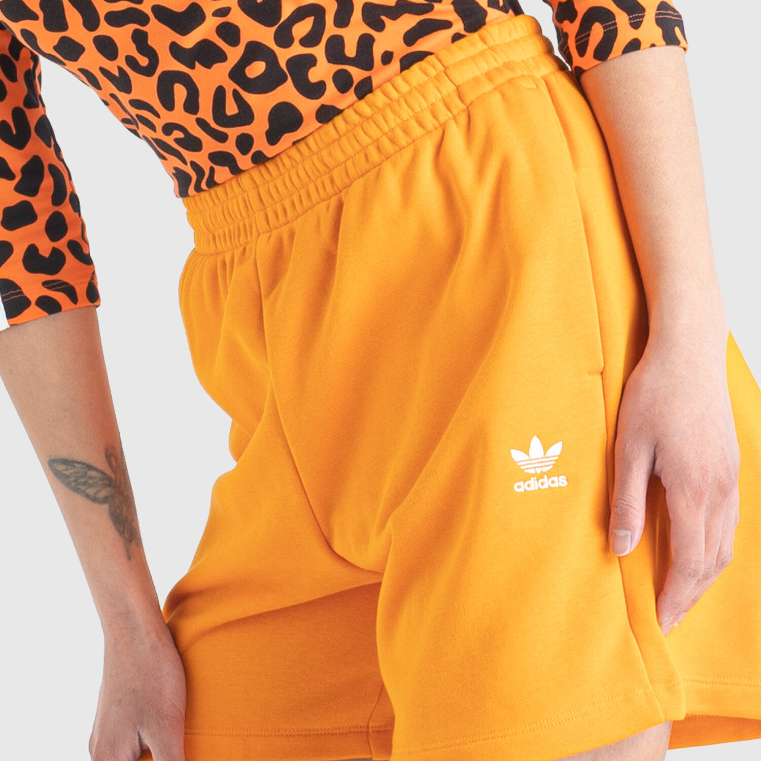 Pantaloncini adidas arancioni best sale