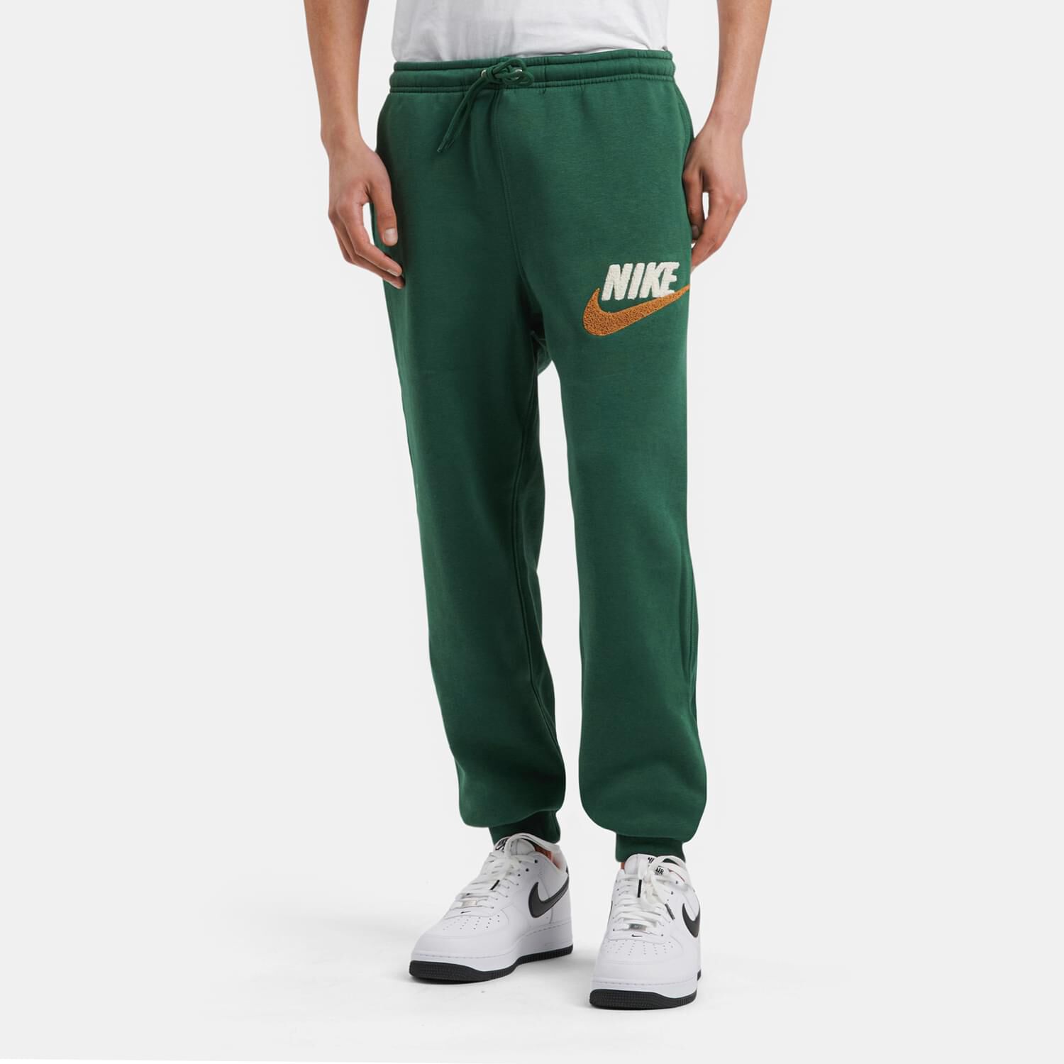 Pantaloni nike verdi strisce bianche shop
